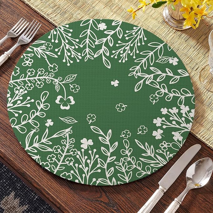 Artoid Mode Green Leaves Vinyl Round Placemats Set of 4, 14 Inch Washable Non-Slip Heat Resistant Woven Plastic Spring Table Mats for Party Kitchen Dining Decor