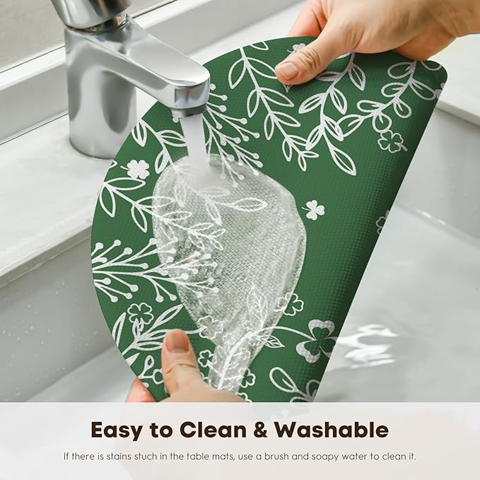 Artoid Mode Green Leaves Vinyl Round Placemats Set of 4, 14 Inch Washable Non-Slip Heat Resistant Woven Plastic Spring Table Mats for Party Kitchen Dining Decor