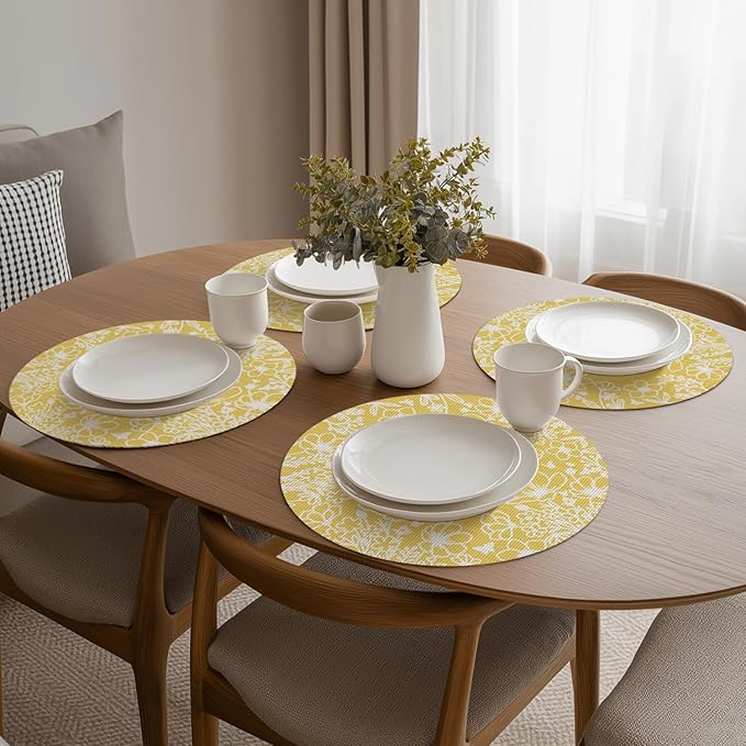 Artoid Mode Spring Leaves Yellow Vinyl Round Placemats Set of 4, 14 Inch Washable Non-Slip Woven Plastic Table Mats for Party Kitchen Dining Decor