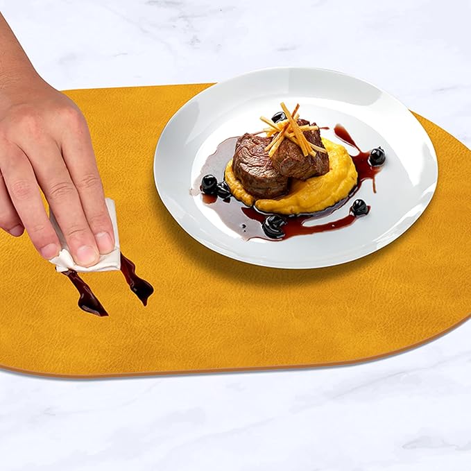 ADRIMER Placemats, Heat Resistant Oval Placemats Set of 8 Washable 12 x 17 Inch, Waterproof Table Mats, Wipeable Pu Place Mats for Kitchen, Dining Room, Yellow