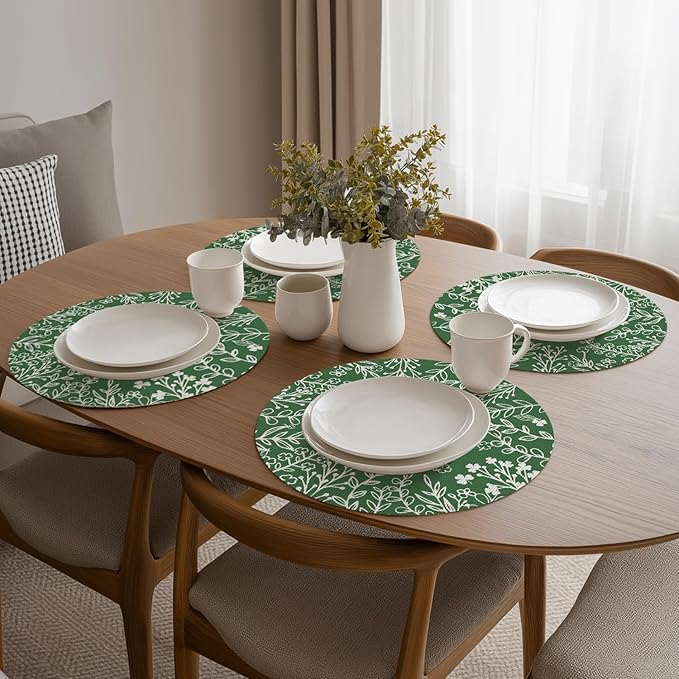Artoid Mode Green Leaves Vinyl Round Placemats Set of 4, 14 Inch Washable Non-Slip Heat Resistant Woven Plastic Spring Table Mats for Party Kitchen Dining Decor