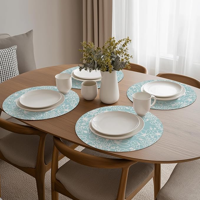Artoid Mode Blue Leaves Vinyl Round Placemats Set of 4, 14 Inch Washable Non-Slip Heat Resistant Woven Plastic Spring Table Mats for Party Kitchen Dining Decor