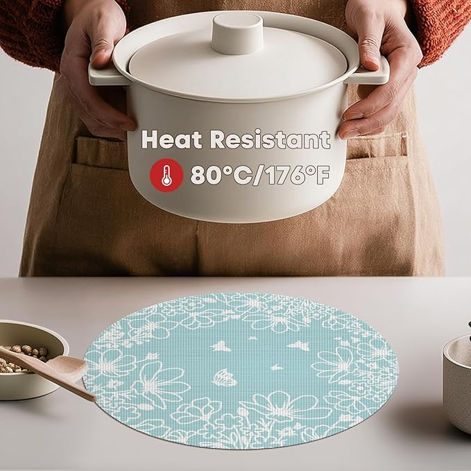 Artoid Mode Blue Leaves Vinyl Round Placemats Set of 4, 14 Inch Washable Non-Slip Heat Resistant Woven Plastic Spring Table Mats for Party Kitchen Dining Decor