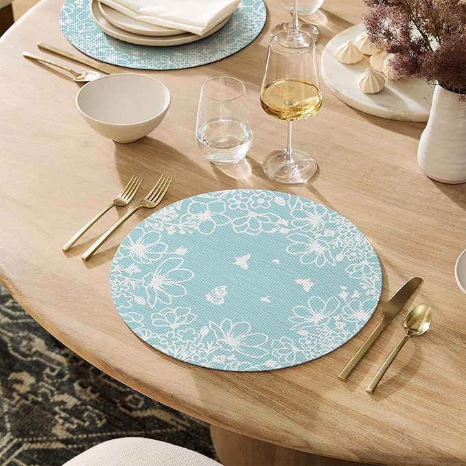 Artoid Mode Blue Leaves Vinyl Round Placemats Set of 4, 14 Inch Washable Non-Slip Heat Resistant Woven Plastic Spring Table Mats for Party Kitchen Dining Decor