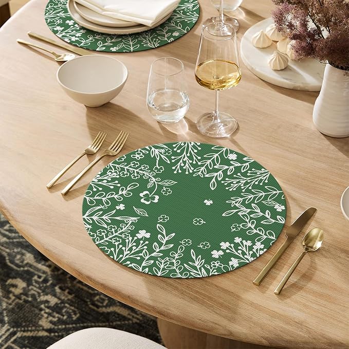 Artoid Mode Green Leaves Vinyl Round Placemats Set of 4, 14 Inch Washable Non-Slip Heat Resistant Woven Plastic Spring Table Mats for Party Kitchen Dining Decor