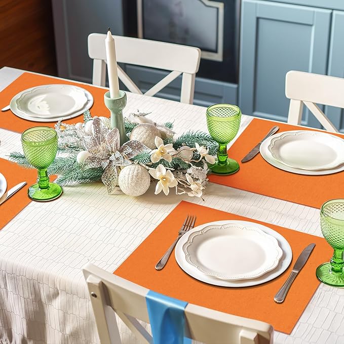 MANSPHIL Orange Placemats Set of 4 Washable Fabric Table Mats Thick Faux Linen Place Mats Heat Resistant Double Layer Wrinkle Free Dining Kitchen Table Decor - 13x19 Inch Oeko Tex Placemat