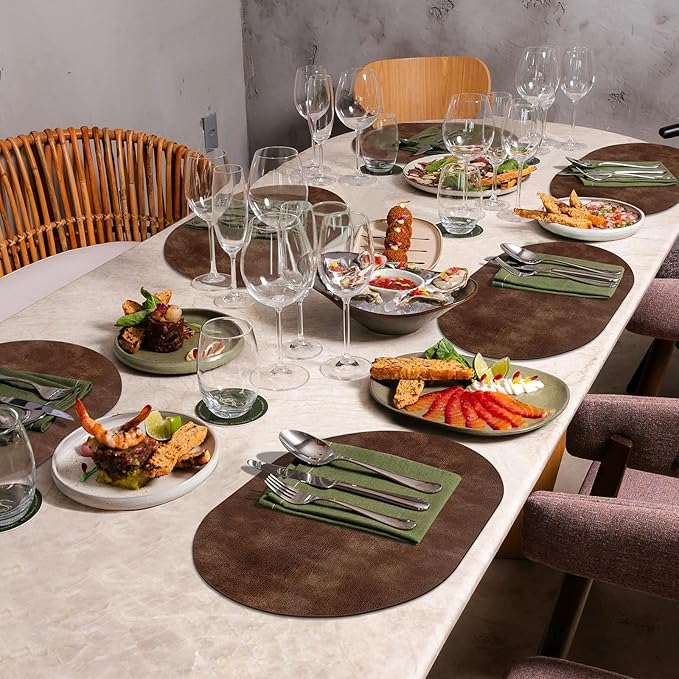 ADRIMER Placemats, Heat Resistant Oval Placemats Set of 12 Washable 12 x 17 Inch, Waterproof Table Mats, Wipeable Pu Place Mats for Kitchen, Dining Room, Brown