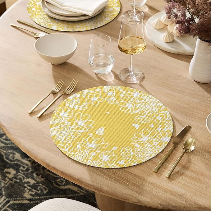 Artoid Mode Spring Leaves Yellow Vinyl Round Placemats Set of 4, 14 Inch Washable Non-Slip Woven Plastic Table Mats for Party Kitchen Dining Decor