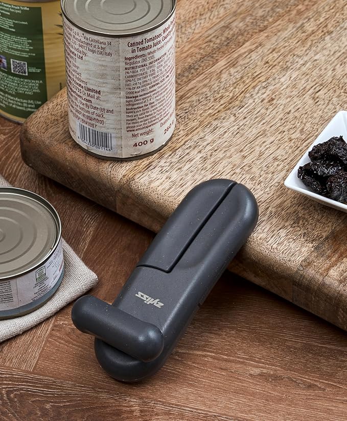 Zyliss MagiCan Manual Can Opener – Ergonomic Gray Handle with Lid-Release for Hands-Free Disposal – Stainless Steel Cutting Wheel, Compact Design, Left or Right-Hand Use – 5-Year Guarantee